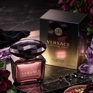 Versace Crystal Noir Perfume With a Deep Purple Bottle And Black Gold Packaging